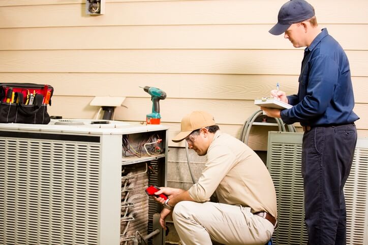 Precision Technicians performing an AC inspection