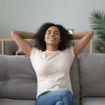 Woman enjoying Clean Air in home